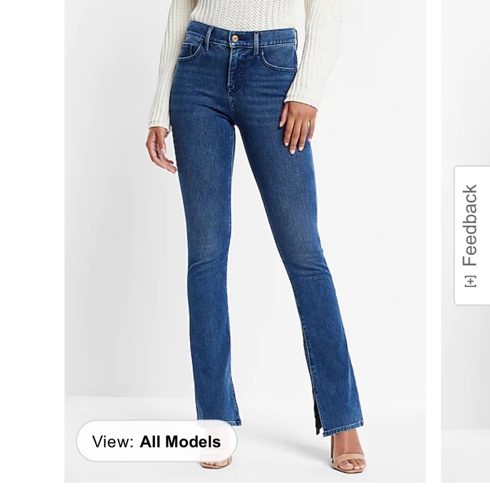 Never worn Express jeans with slit bottoms.